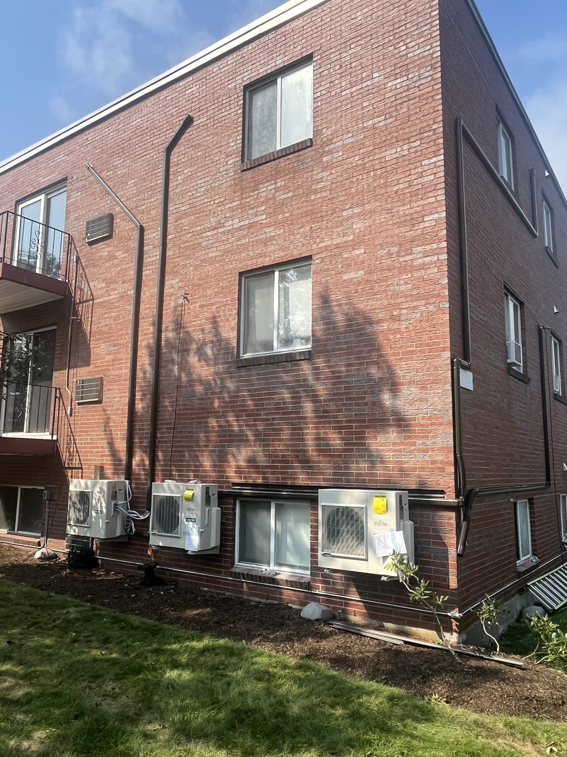 A Braintree apartment building with heat pumps installed by Endless Energy