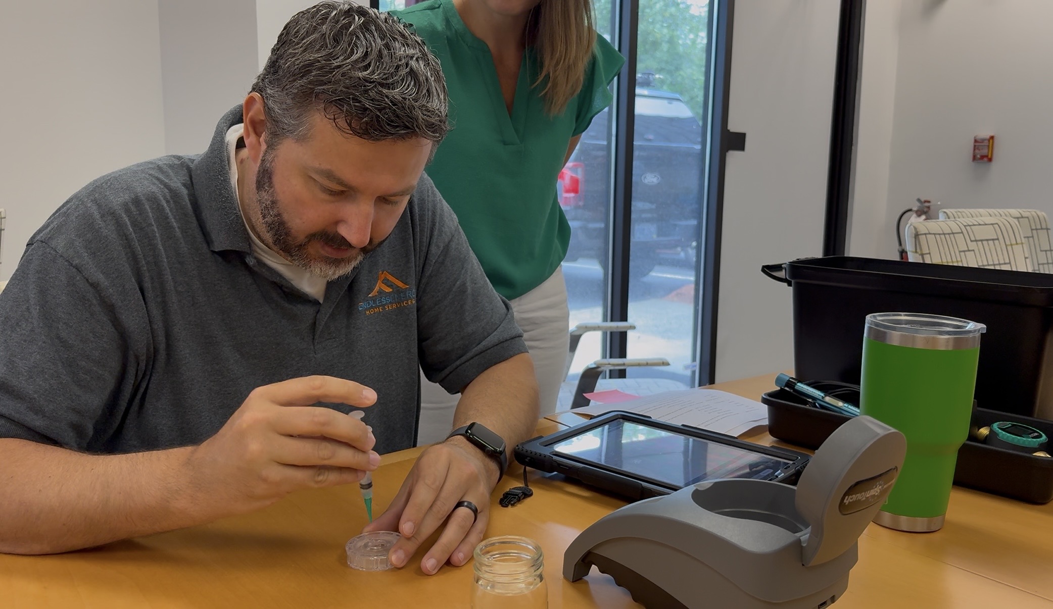 A trained Endless Energy water treatment technician tests water in Marlborough, Massachusetts