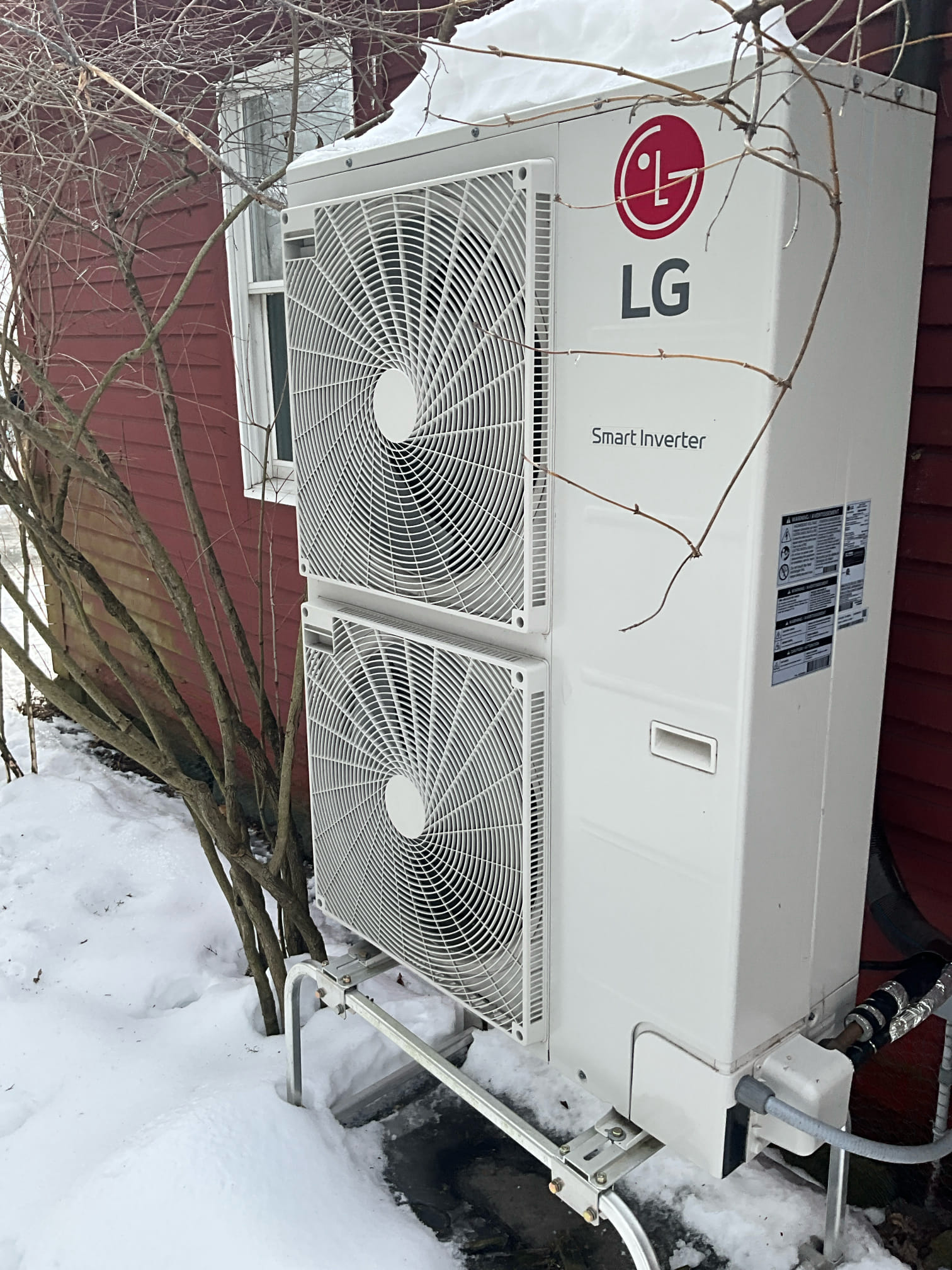 LG heat pumo system in Topsfield Massachusetts installed by Endless Energy in the snow