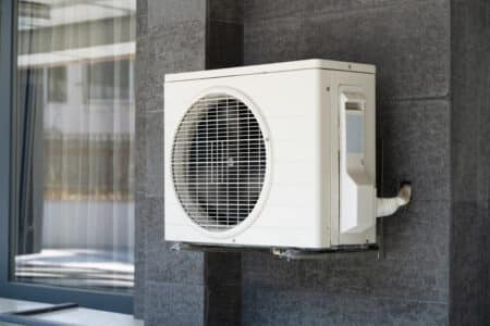 heat-pump-located-outside-by-a-building