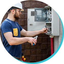 electrician working on electrical box