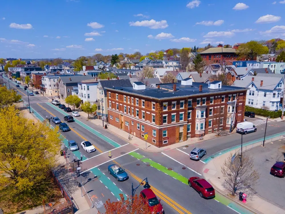Somerville city center aerial view on Somerville Avenue at Central Street in spring, city of Somerville, Massachusetts MA, USA.
